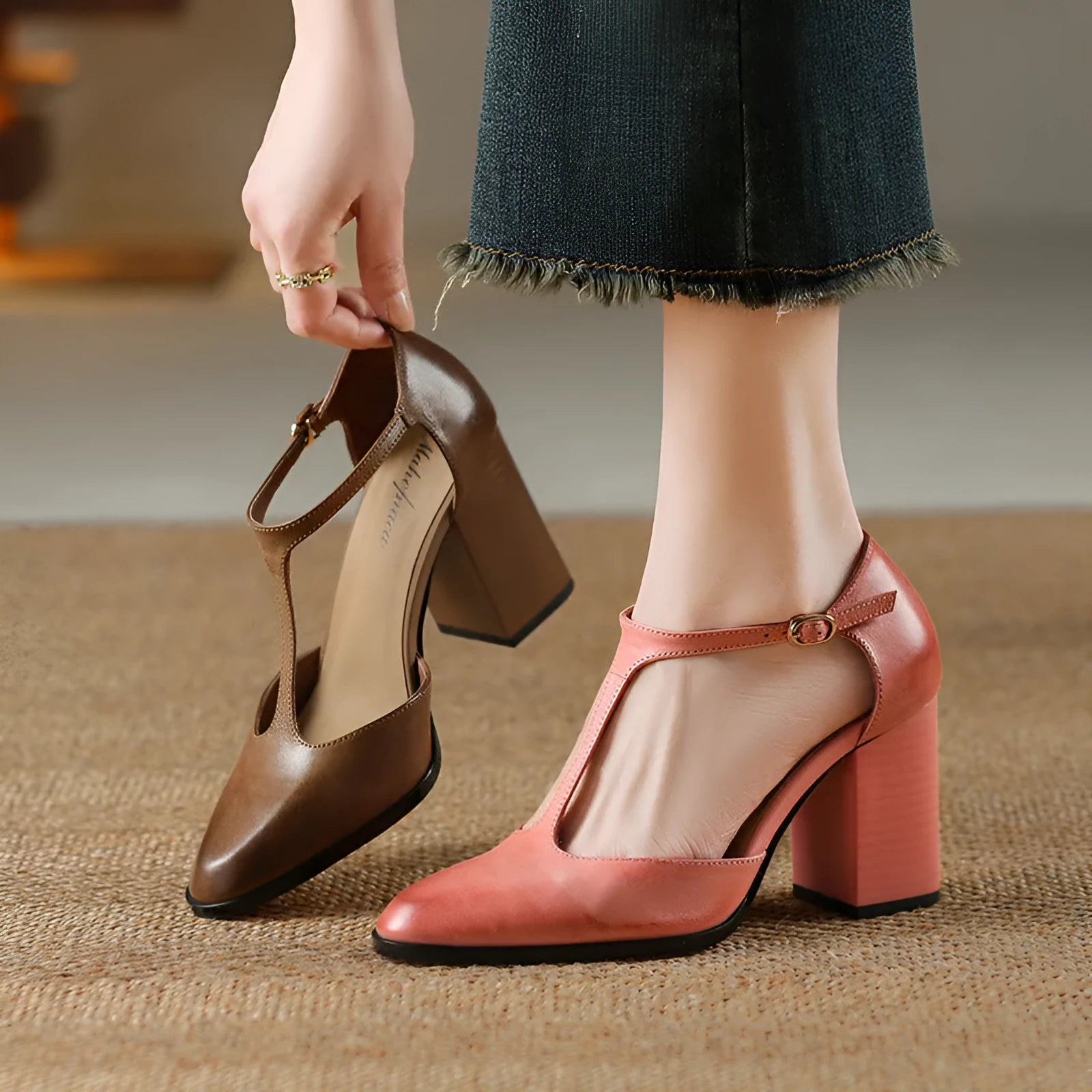 Baotou hollow women's shoes in pink and dark brown, showing pointed toe Mary Jane style with buckle.