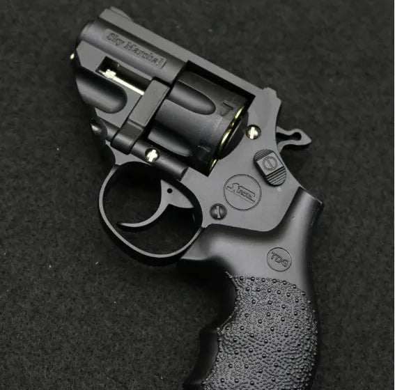 Alloy hand small gun simulation toy model in PA/nylon, sky blue colour, on display