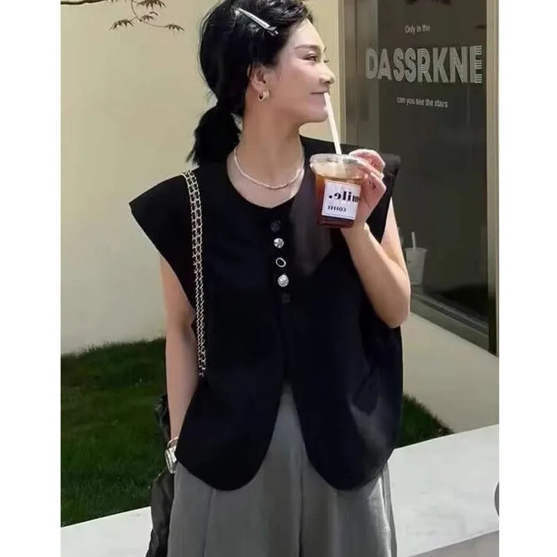 Women's loose fit polyester vest with pocket details in milky white colour
