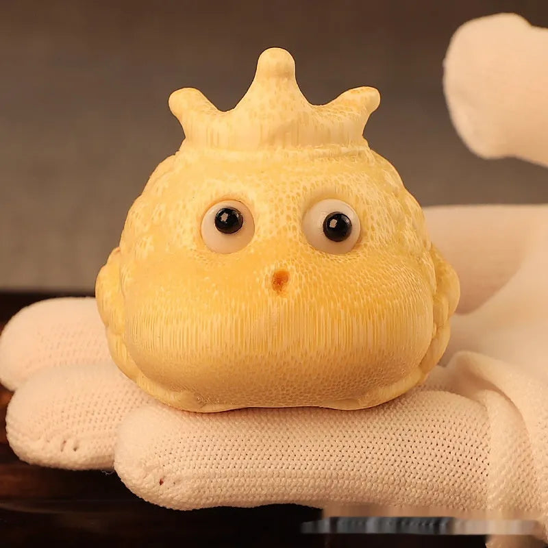 Hand-carved bamboo ornament of a cute Crown Princess toad with live eye detail