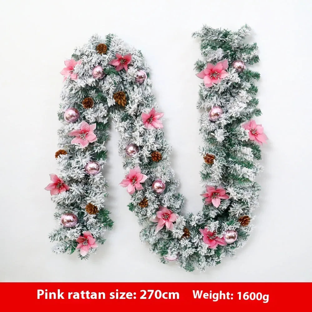 American-style flocked rattan Christmas garland in red, draped over a mantelpiece.