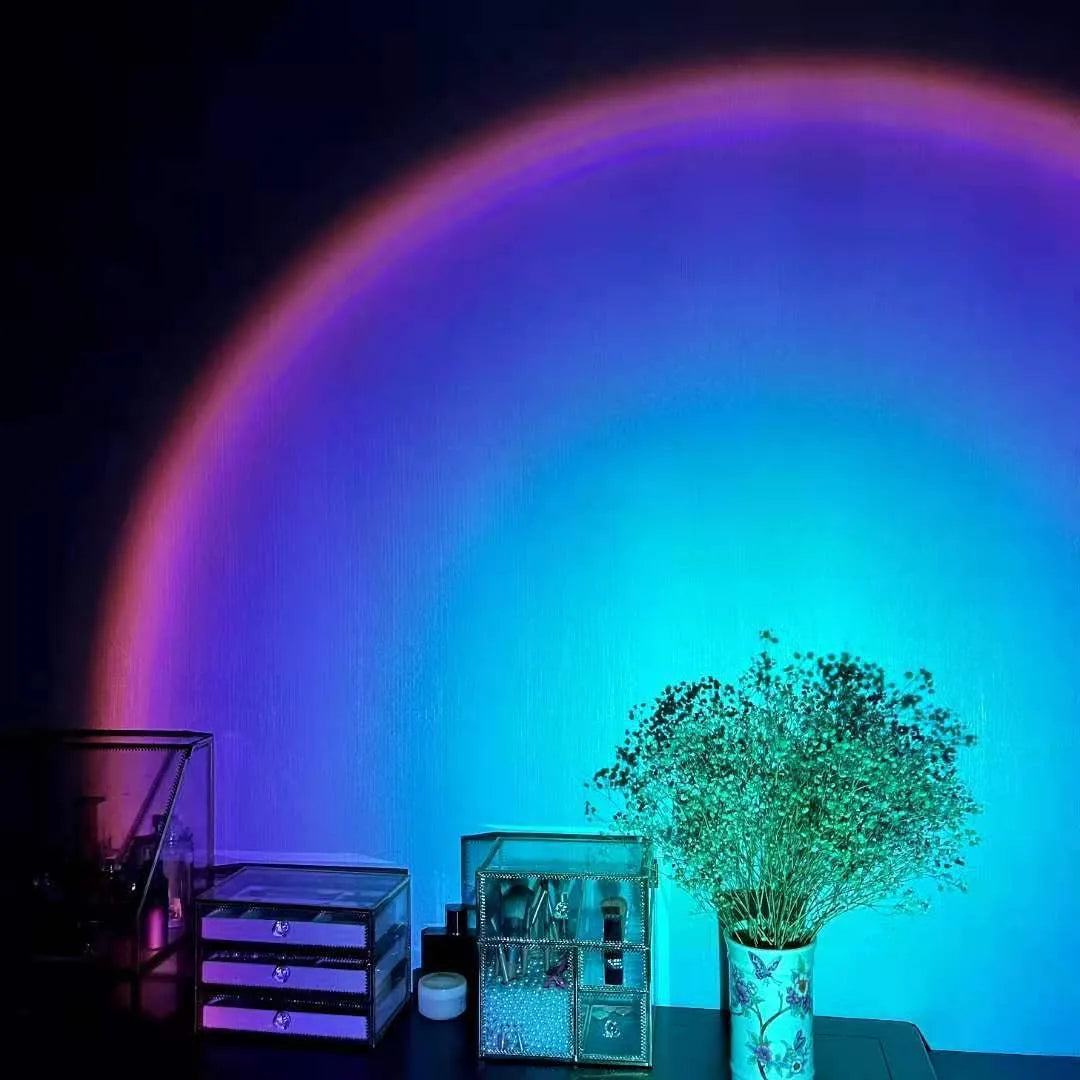 Sunset red rechargeable projection lamp showing rainbow colour light effects