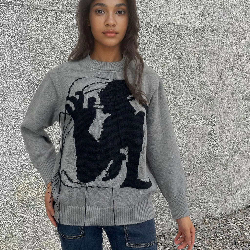 Women's grey alpaca wool sweater with tassel detailing and loose fit