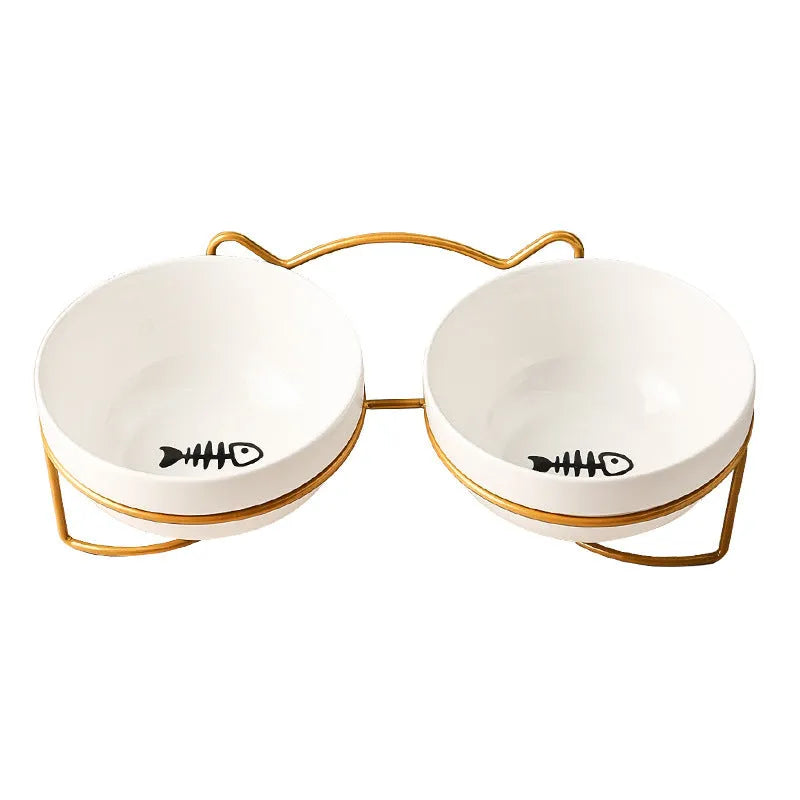 White ceramic cat bowl with iron frame in cat footprints design