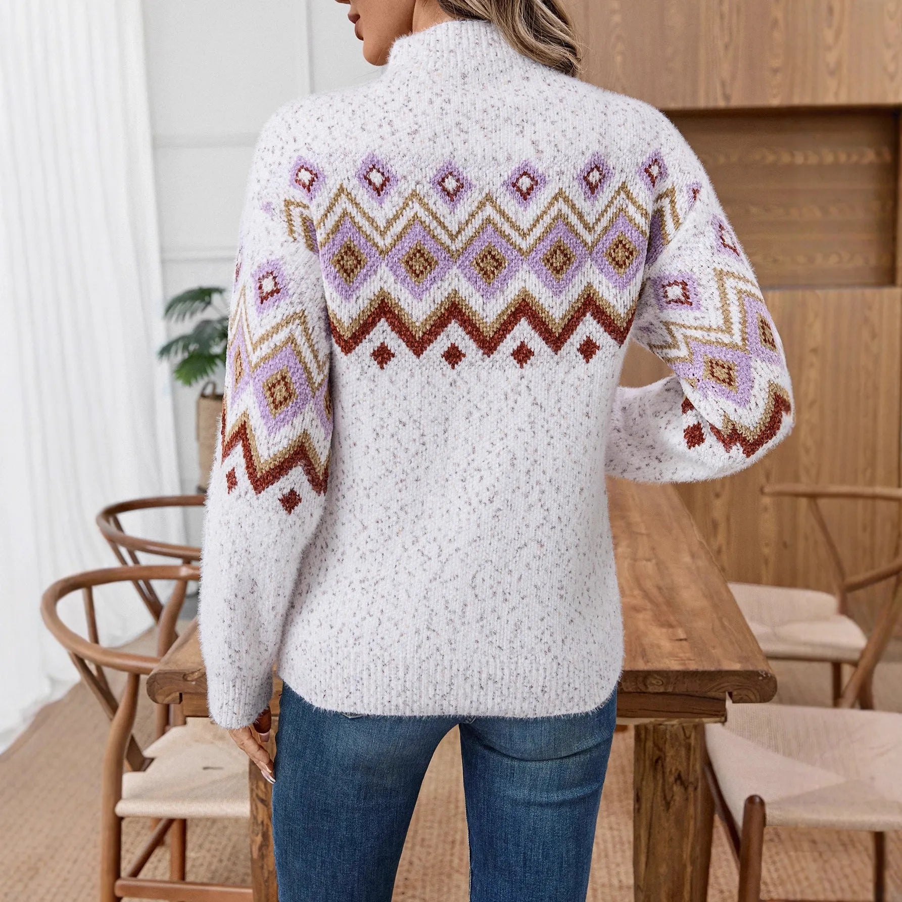 White loose fit sweater with geometric pattern and half turtleneck collar