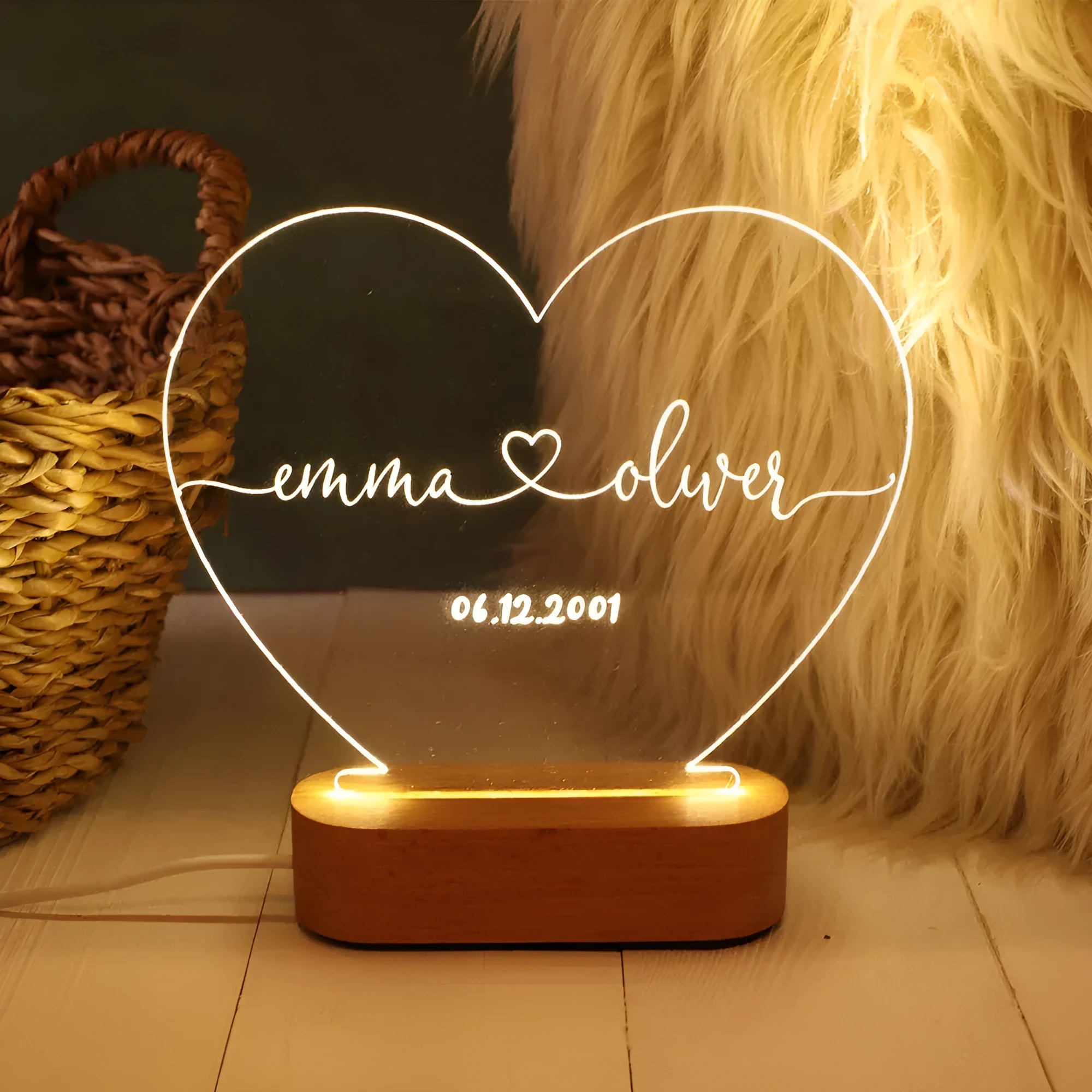 Personalised acrylic night light with engraved names and dates, measuring 20cm by 11.5cm