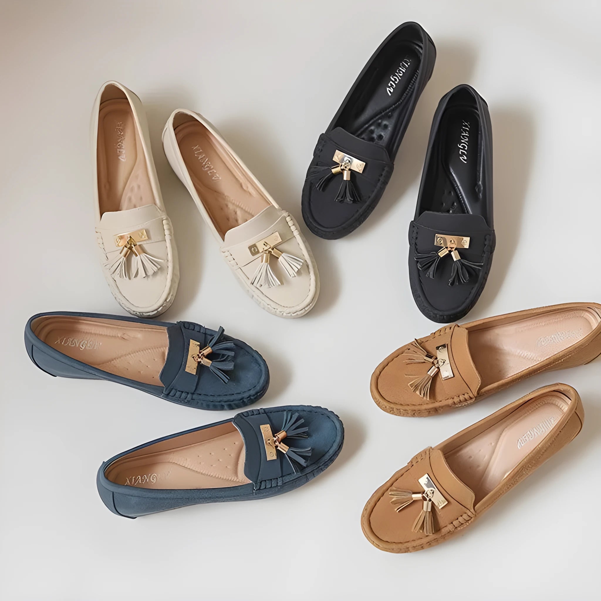 Women's beige height increasing insole casual work shoes with round toe and mid heel.