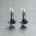 Copper earrings with diamond design and blue zircon inlay for women.