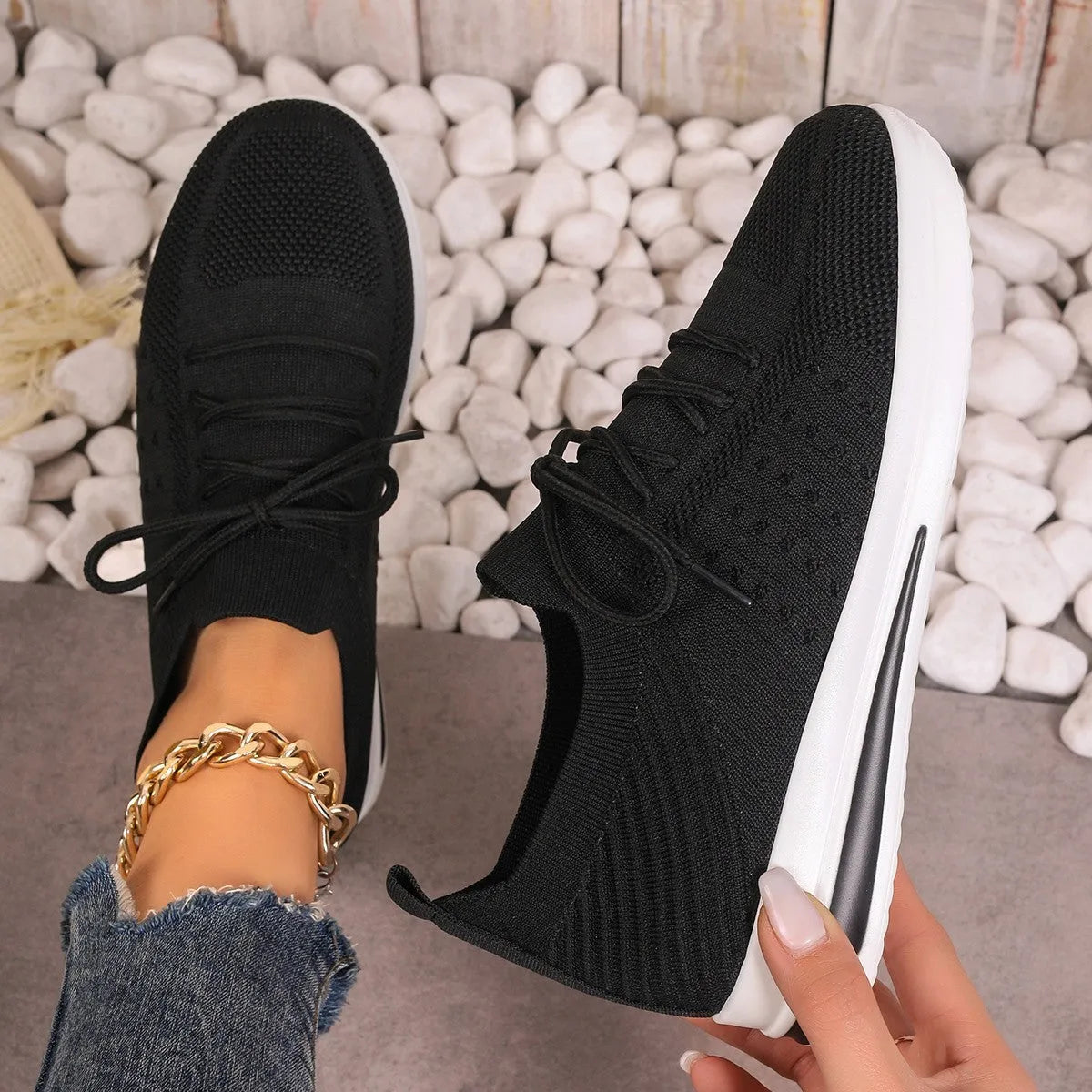 Women's low-top casual sneakers in red, black, or blue with round toe and lace-up front.