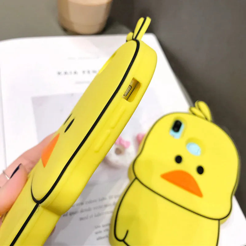 Green silicone iPhone case with a cartoon animal design on the back.