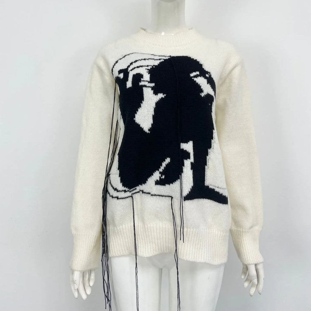 Women's grey alpaca wool sweater with tassel detailing and loose fit