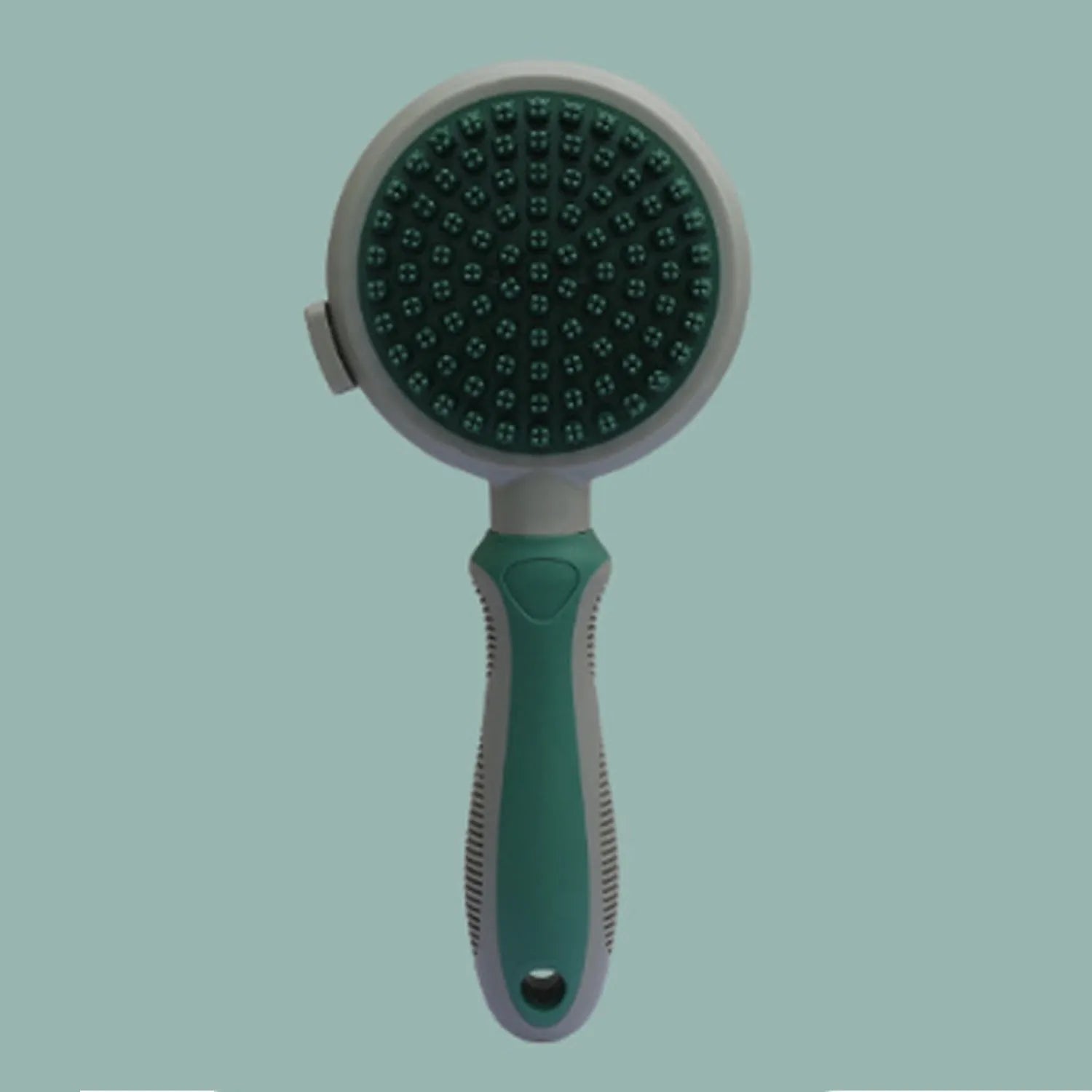 Double-sided pink cat brush with release button and matching flea comb for pet grooming