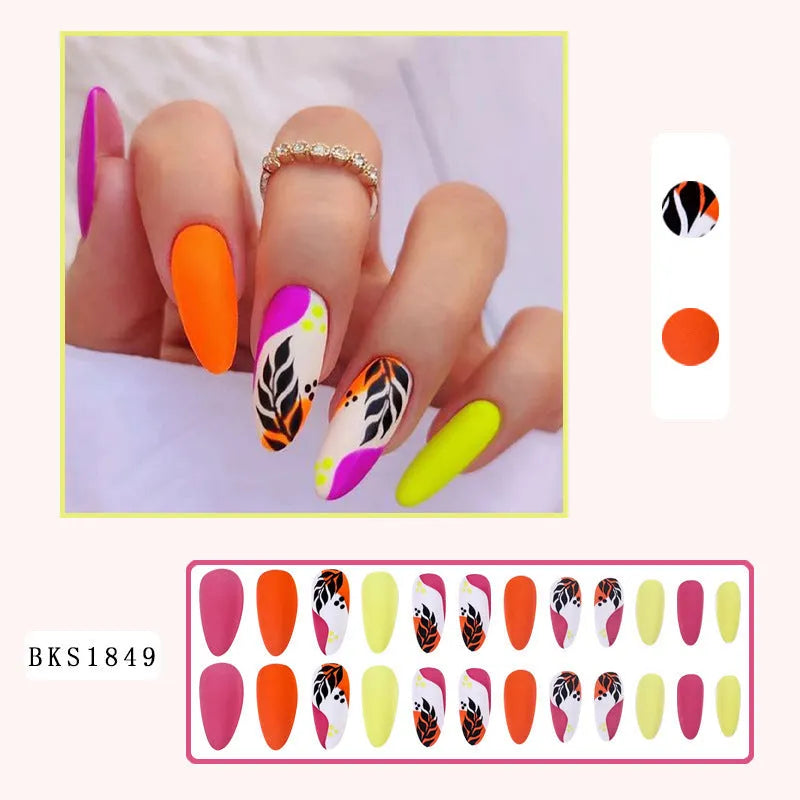 Wear Armour medium almond frosted nail stickers showing four different pattern designs.