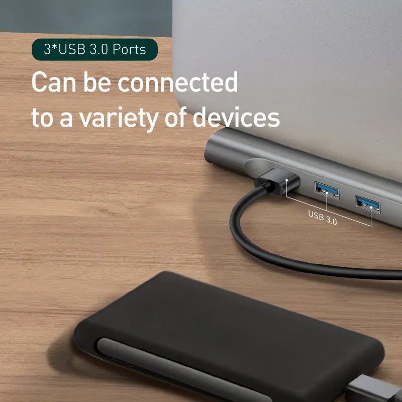Grey aluminium USB-C docking station with cooling bracket showing ten connectivity ports