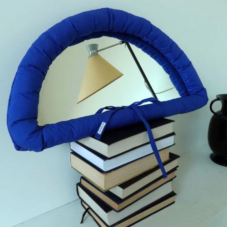 Hanging fabric mirror panel with cotton filling in white, black, or sapphire blue colours