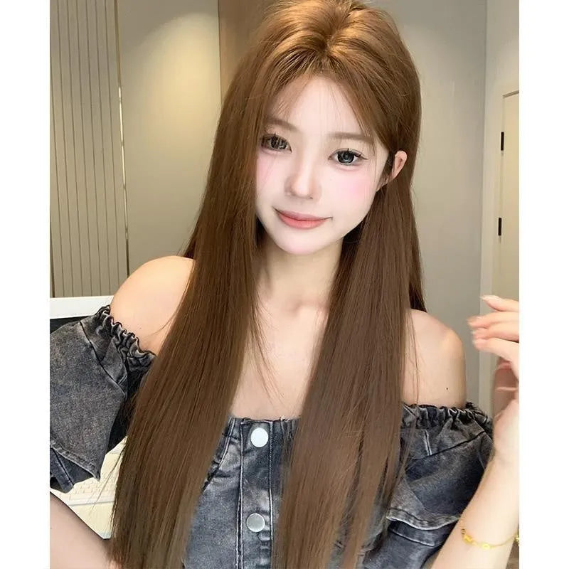 Warm brown lace front wig with centre-parted bangs and long straight synthetic hair