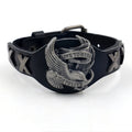 Black geometric leather bracelet with eagle watch-button clasp showing tapered width from 3.8cm to 1.7cm