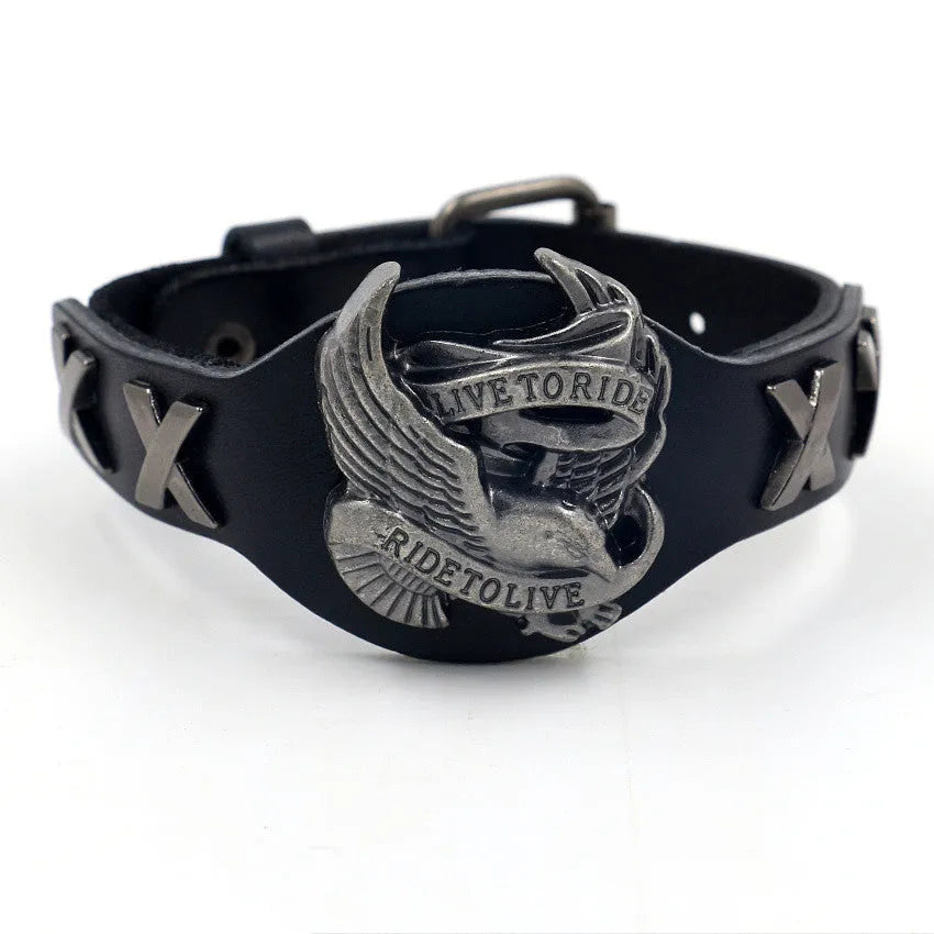 Black geometric leather bracelet with eagle watch-button clasp showing tapered width from 3.8cm to 1.7cm