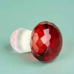 Small crystal mushroom decoration in modern geometric design, 40mm by 53mm.
