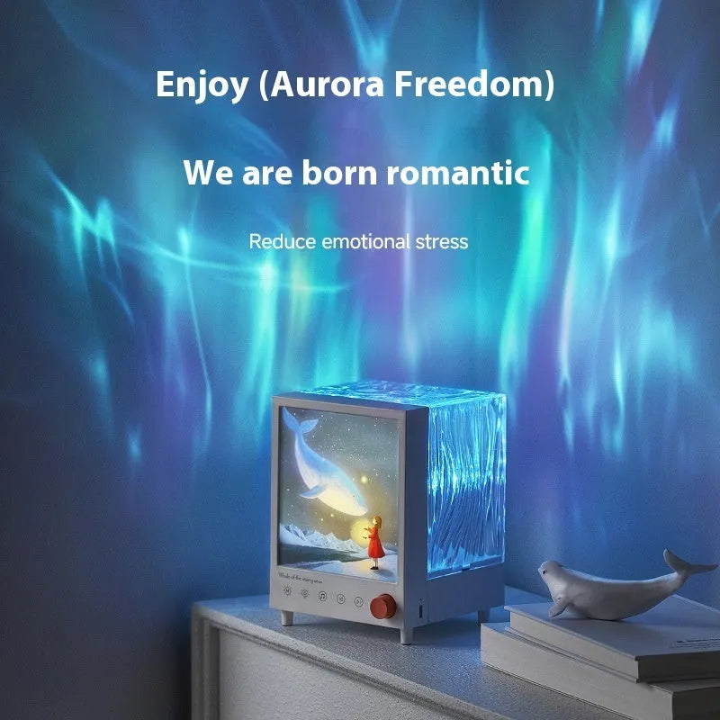 Aurora Treasure Box projection lamp projecting star sea whale light pattern, with Bluetooth speaker.
