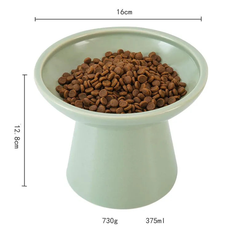 Blue ceramic elevated cat food bowl with wide shallow dish for whisker fatigue prevention.
