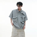Men's loose fit polo shirt with deconstructed multi-collar design and geometric patterned V-neck