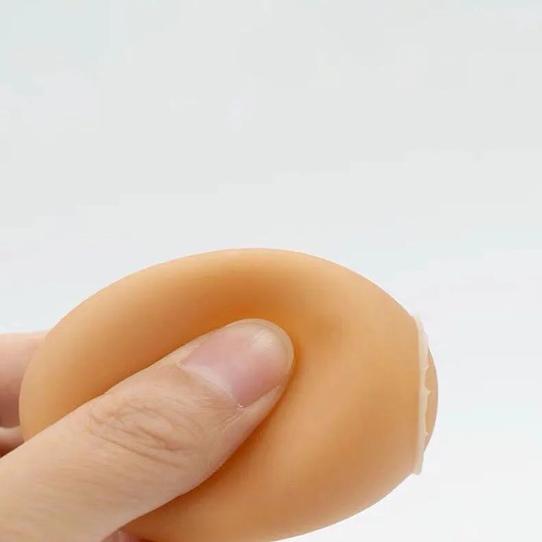 Egg-shaped dog toy with sound simulation for teeth cleaning and interactive play