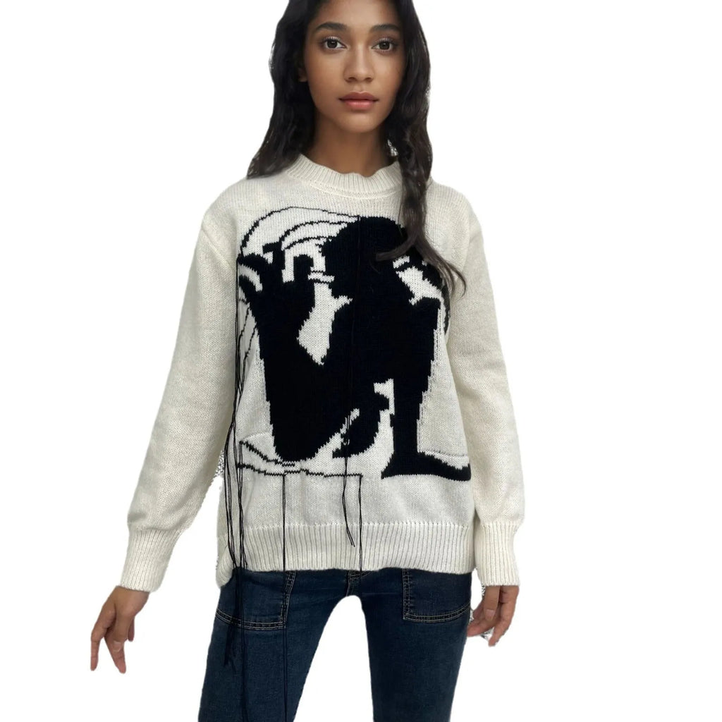 Women's grey alpaca wool sweater with tassel detailing and loose fit