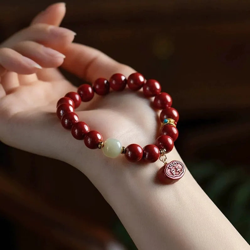Natural cinnabar Emperor sandstone Ping An Fu Lu bracelet with 8mm and 10mm size options.