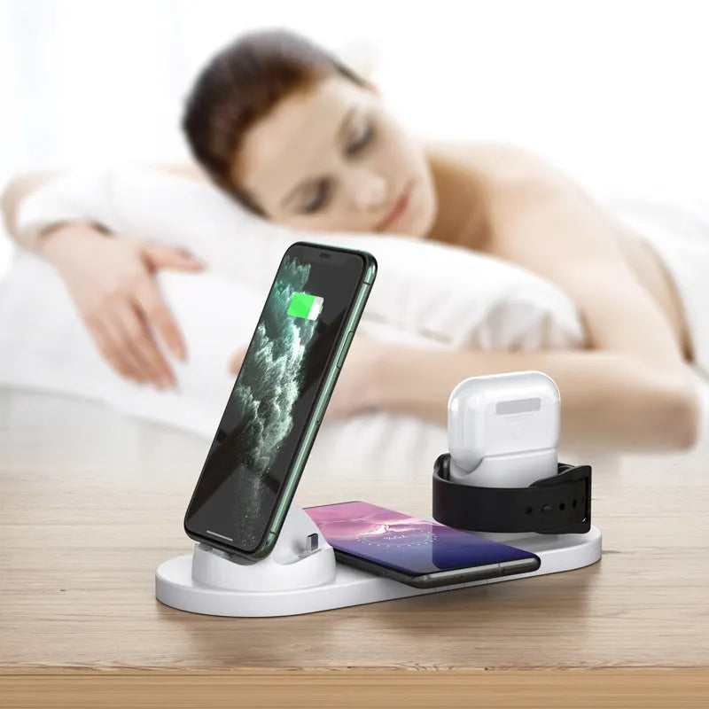 Black 6-in-1 wireless charging station holding phone with AirPods and watch charging
