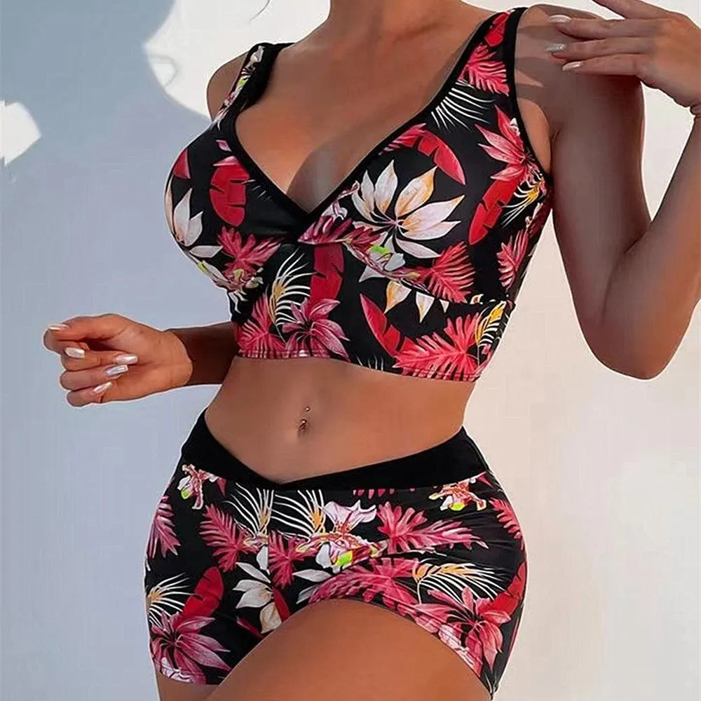 Women's two-piece swimsuit with boxer shorts in a multi-colour print pattern