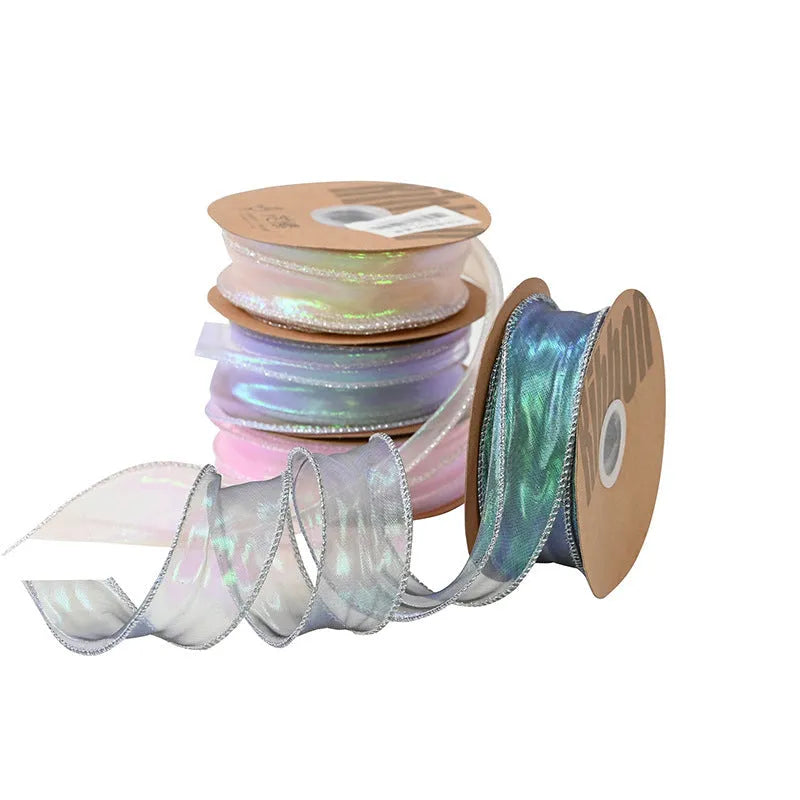 Roll of 4cm wide fishtail yarn mesh ribbon in illusion colour options for floral and gift decoration
