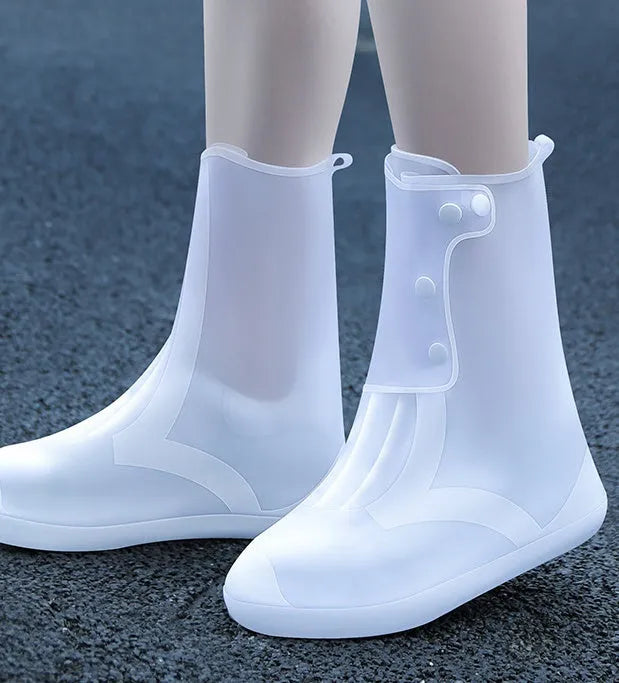White PVC high top reusable waterproof shoe covers for women showing size options and water resistant design