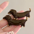 Dachshund dog design hair barrettes with electroplated finish, showing front and back views