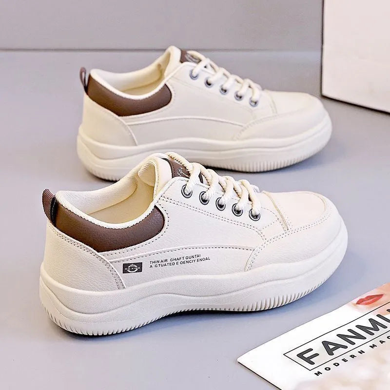 Women's white Korean-style leather pumps with cross strap design and round toe