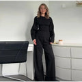 Women's polar fleece suit set showing O-neck pleated top with long sleeves and matching wide leg trousers