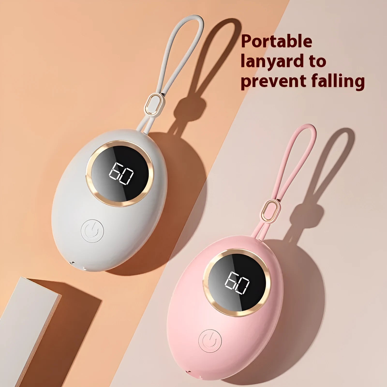 USB-powered hand warmer with digital display showing battery level and heat settings
