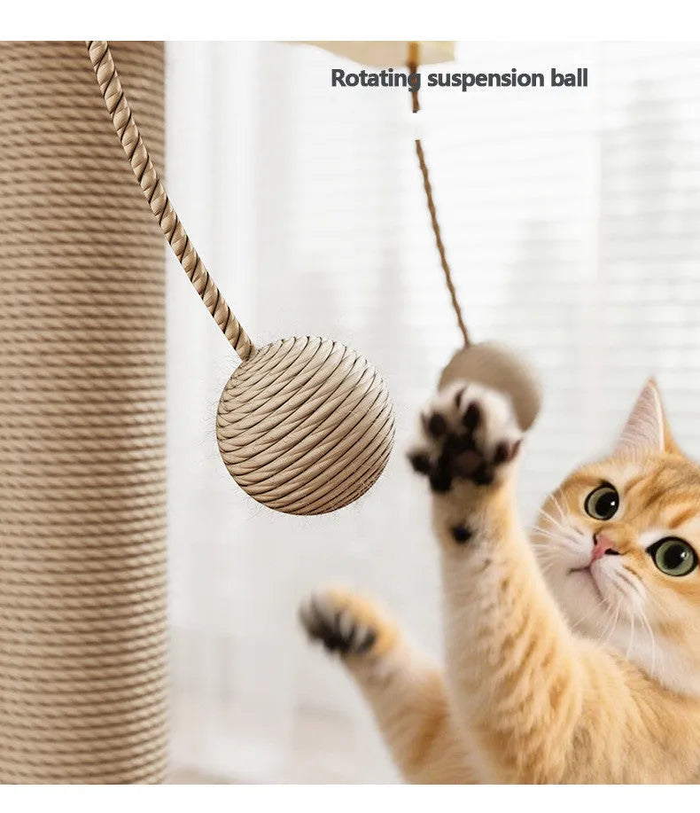Simple cat climbing frame with windmill design and hanging ball toy on carpet leather surface
