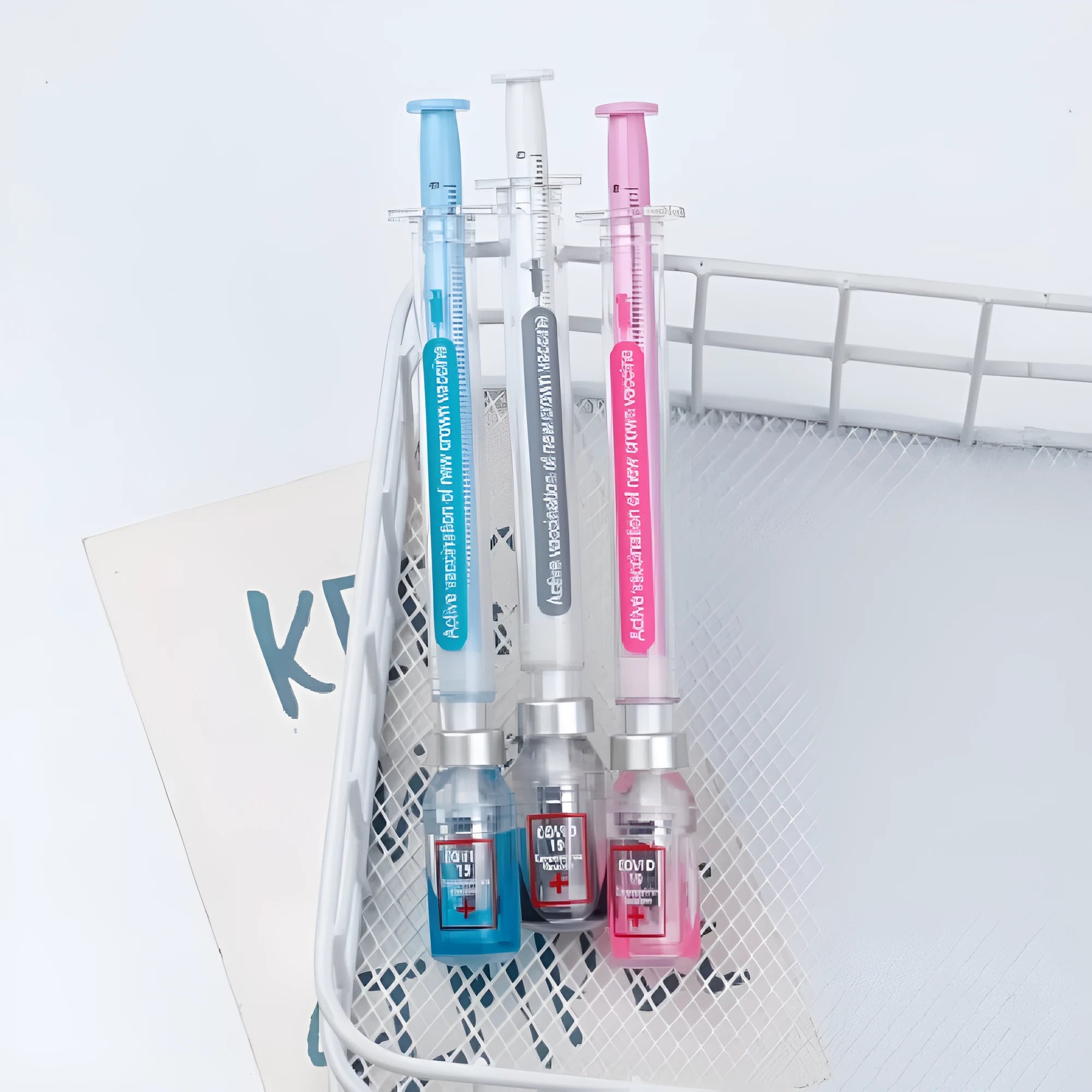 Vaccine themed gel pen with plastic cap, black 0.5mm refill, showing 15.7cm length.