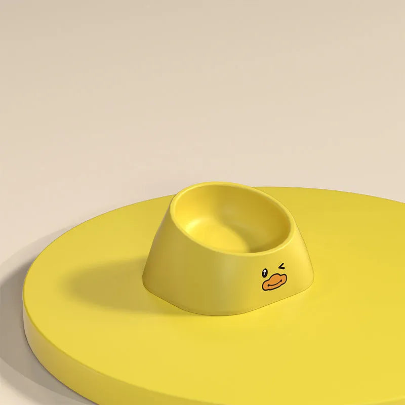 Green tilted stainless steel pet bowl showing 15-degree feeding angle