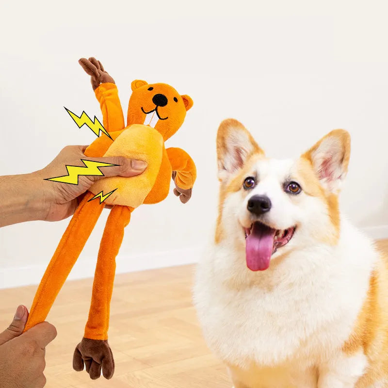 Orange soft plush dog toy with noise-maker for tug-of-war and chewing play