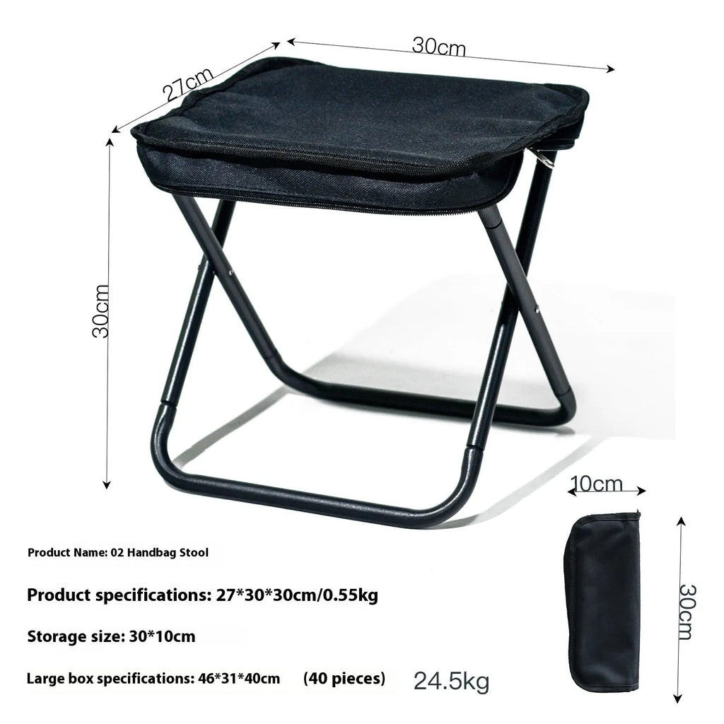 Foldable outdoor camp stool in Oxford cloth, shown in a khaki colour, compactly folded with carry handle.