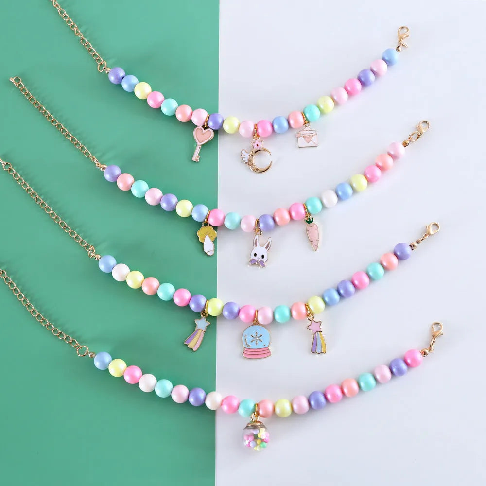 Adjustable pet collar with colourful macaron resin charms in moon, meteor, rabbit designs