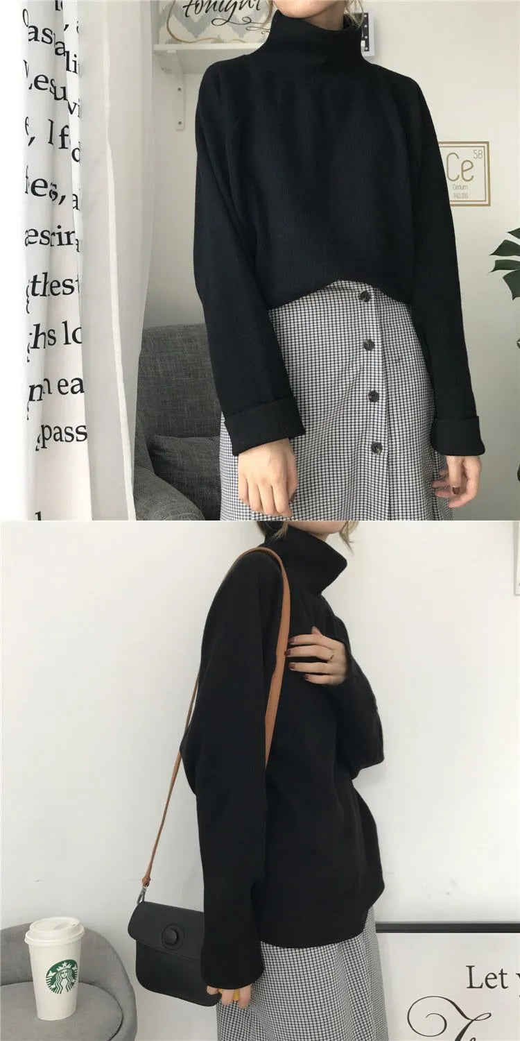 Women's loose fit long sleeve top in solid apricot colour, showing half-high neckline.