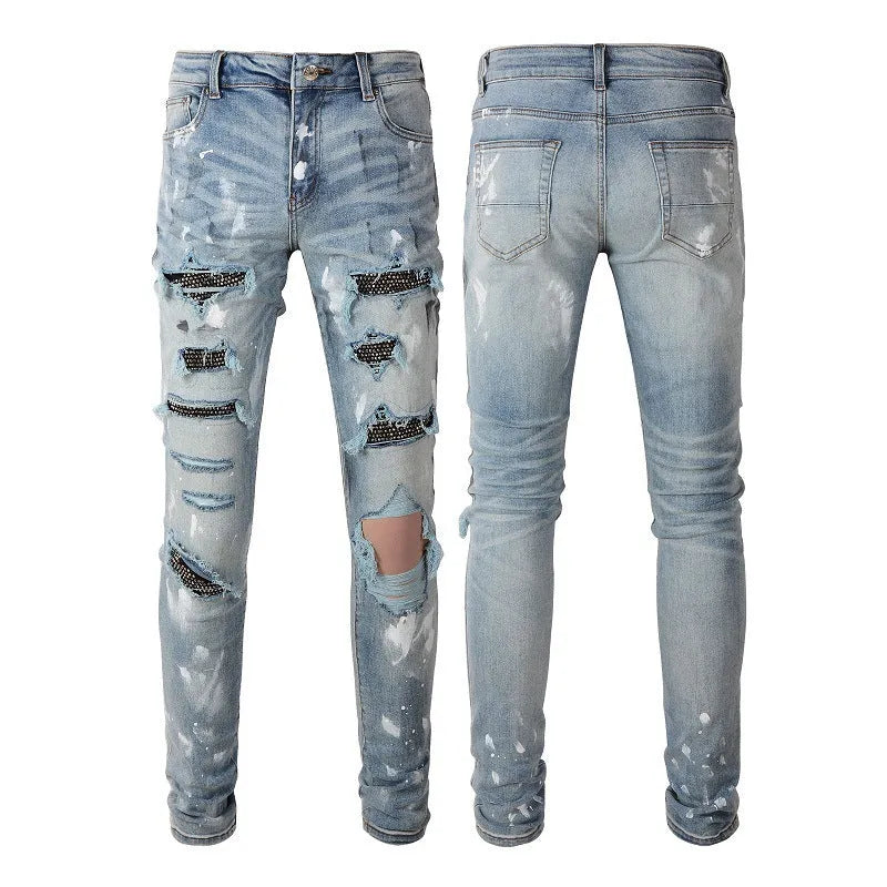 Blue denim stretch retro ripped diamond jeans for men with diamond pattern tears, front view