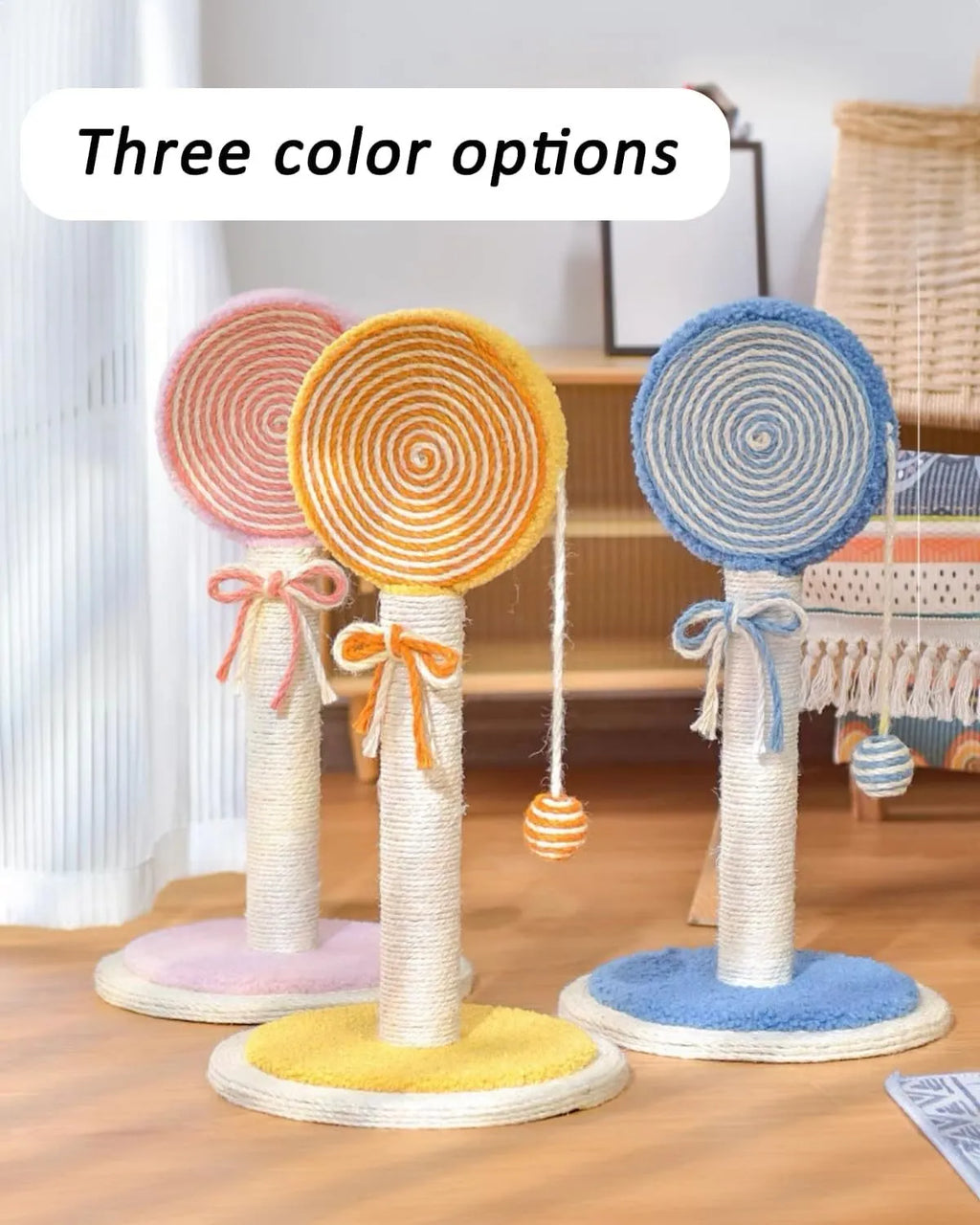 Blue sisal rope cat scratching post with a hanging ball on a sturdy wooden base.