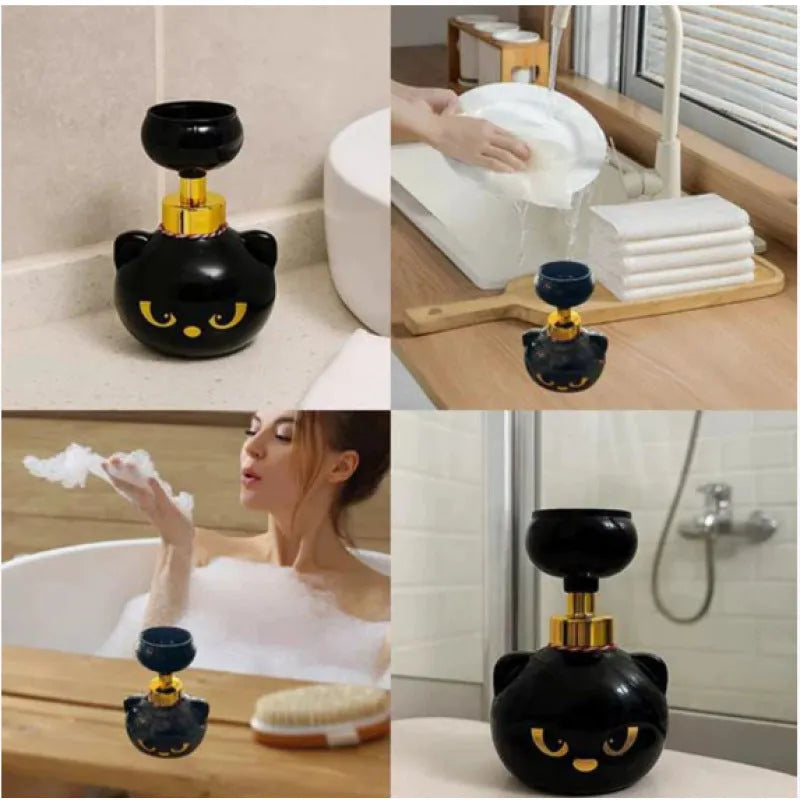 Black cartoon cat shaped manual foam soap dispenser on a counter.