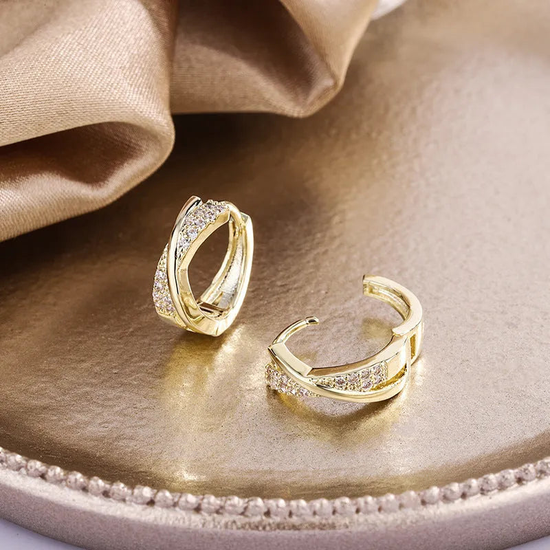 Geometric copper drop earrings with 14K yellow finish and zircon treatment