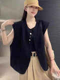 Women's loose fit polyester vest with pocket details in milky white colour