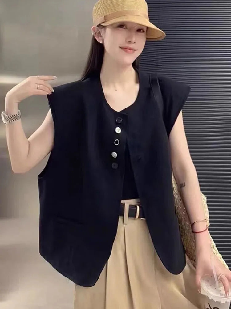 Women's loose fit polyester vest with pocket details in milky white colour